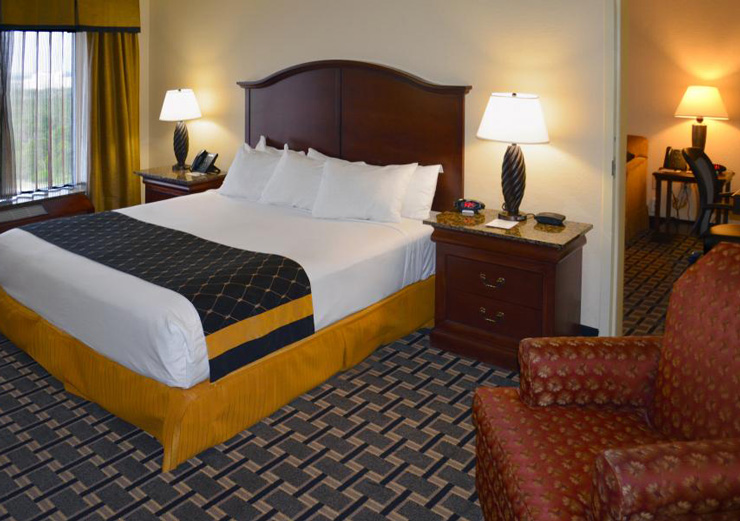 Rozen Plaza Hotel - bedroom