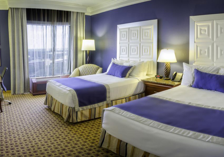Rozen Plaza Hotel - bedroom